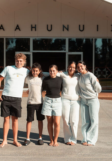Group of tamariki smiling at camera